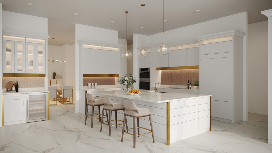Marble kitchen island with brass detailing and pendant lighting